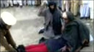 Girl being flogged: Still from the cell phone video circulated on the Internet and broadcast (repeatedly) on the private channels 