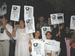 AmmiMazar-Aug14-02 Karachi, Aug 14, 2002: Citizens' peace demonstration at 'Quaid-e-Azam' M.A. Jinnah's Mazar - in the midst of testosterone-charged young men roaring about on motorcycles waving huge Pakistan flags. On learning what it was about, some of them joined the demo...