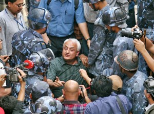 Kanak Dixit being arrested, April 2006, Kathmandu