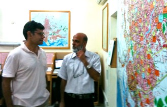 Engaged and committed: Aman Foundation CEO Ahsan Jamil and Manager Command and Control Center in discussion.