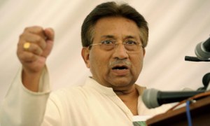Musharraf and the famous fist. Photo T. Mughal/EPA