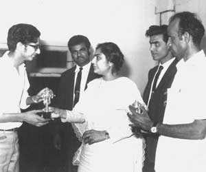 Distributing prizes at a debate competition at Islamia College