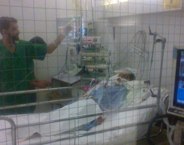 8-year old Samar Abbas in critical condition at AKUH: He has a blood clot in his brains, a broken jaw and a collapsed respiratory system. Photo: Anas Mallick