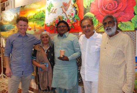 Celebrating Indian and Pakistani Independence Days with Karachi Truck Artist Haider Ali and friends at Dover Rug (L-R): Ken Shulman, Hardeep Mann, Haider Ali, Mahmud Jafari, Jaspal Singh. Photo: Beena Sarwar 