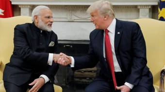 U.S. President Trump shakes hands with India's Prime Minister Modi in the Oval Office the White House in Washington